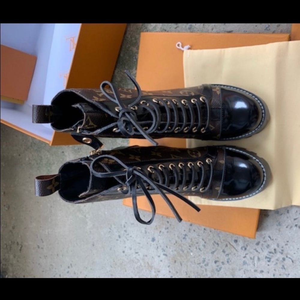 Brown laced up high high boots